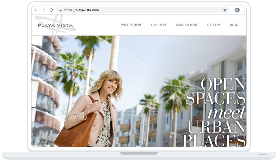 laptop showing Playa Vista website